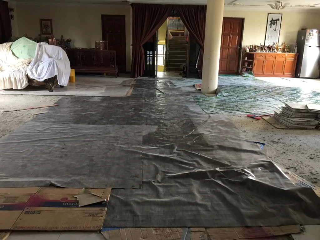 Home remodeling site with protective floor coverings in San Jose.