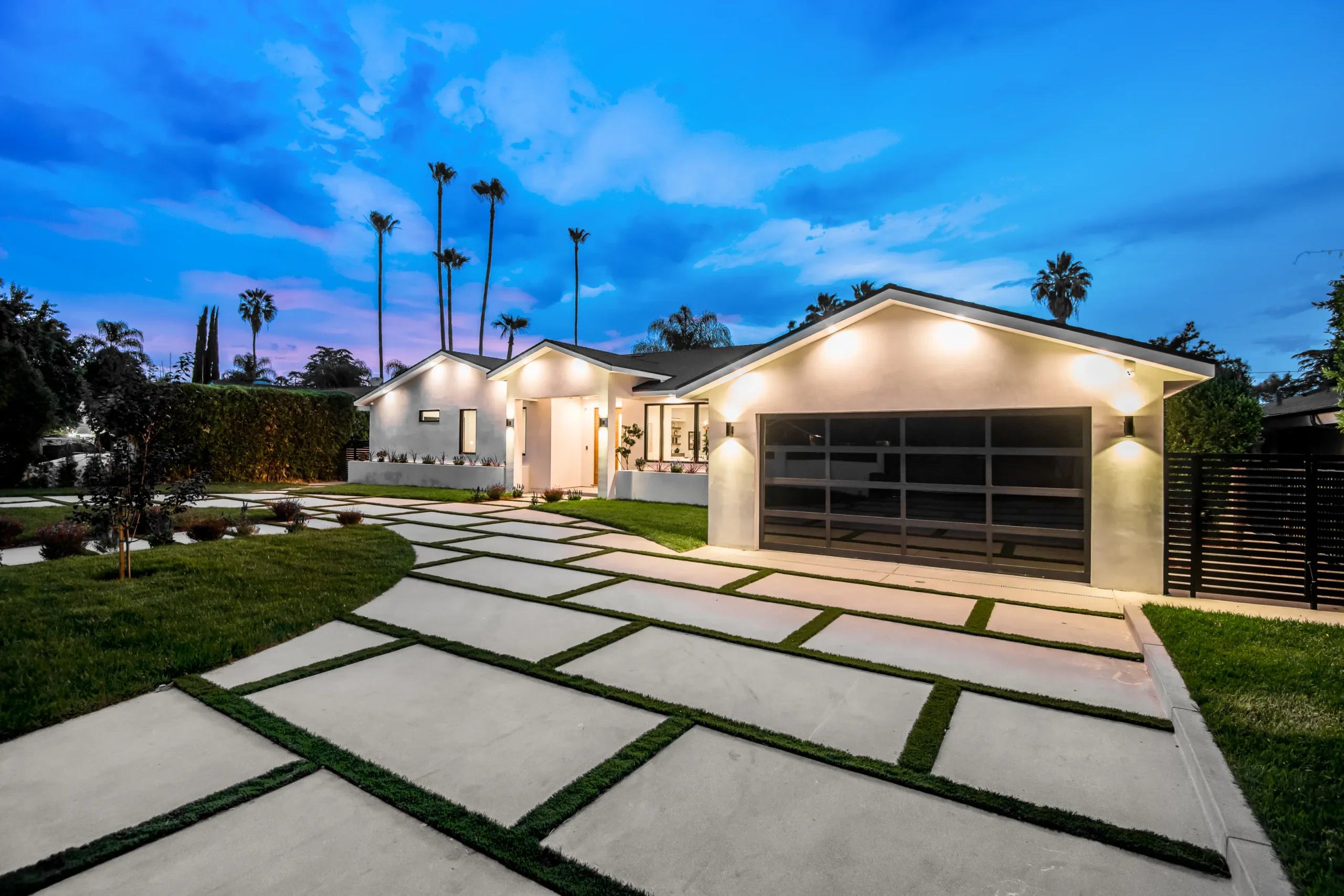 Contemporary home in San Jose with sleek driveway and lush landscaping.