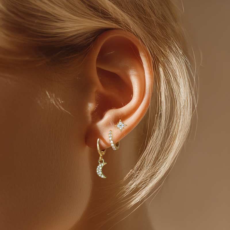 Celestial gold earring set — moon charm hoop and North Star stud