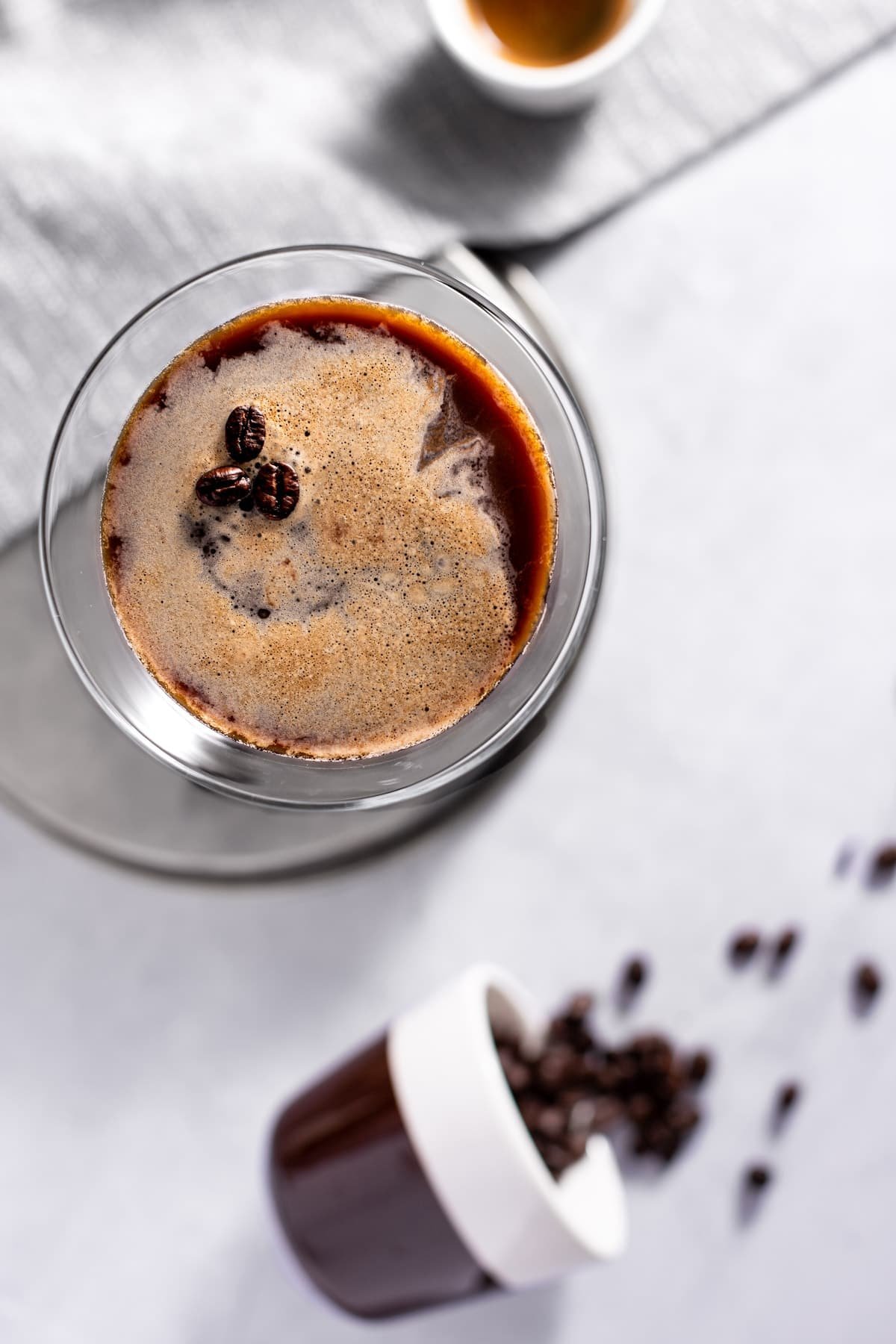 Gin espresso martini with chocolate drizzle — strong holiday cocktail
