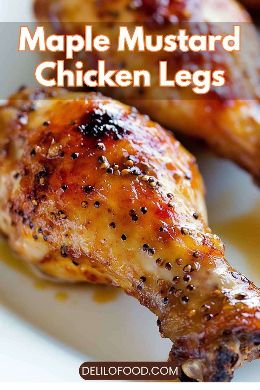 Maple mustard chicken legs with a sweet tangy glaze, oven-baked drumsticks topped with fresh herbs, golden caramelized coating, cozy homemade dinner