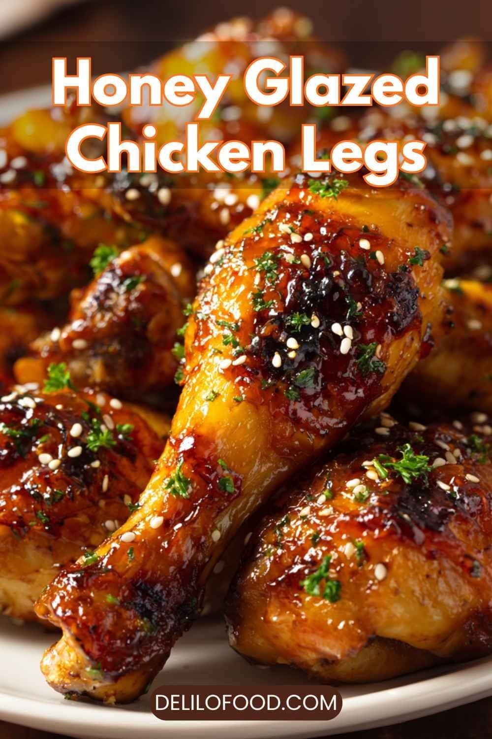 Honey glazed chicken legs coated in a glossy sweet sauce, baked to golden perfection with caramelized edges.