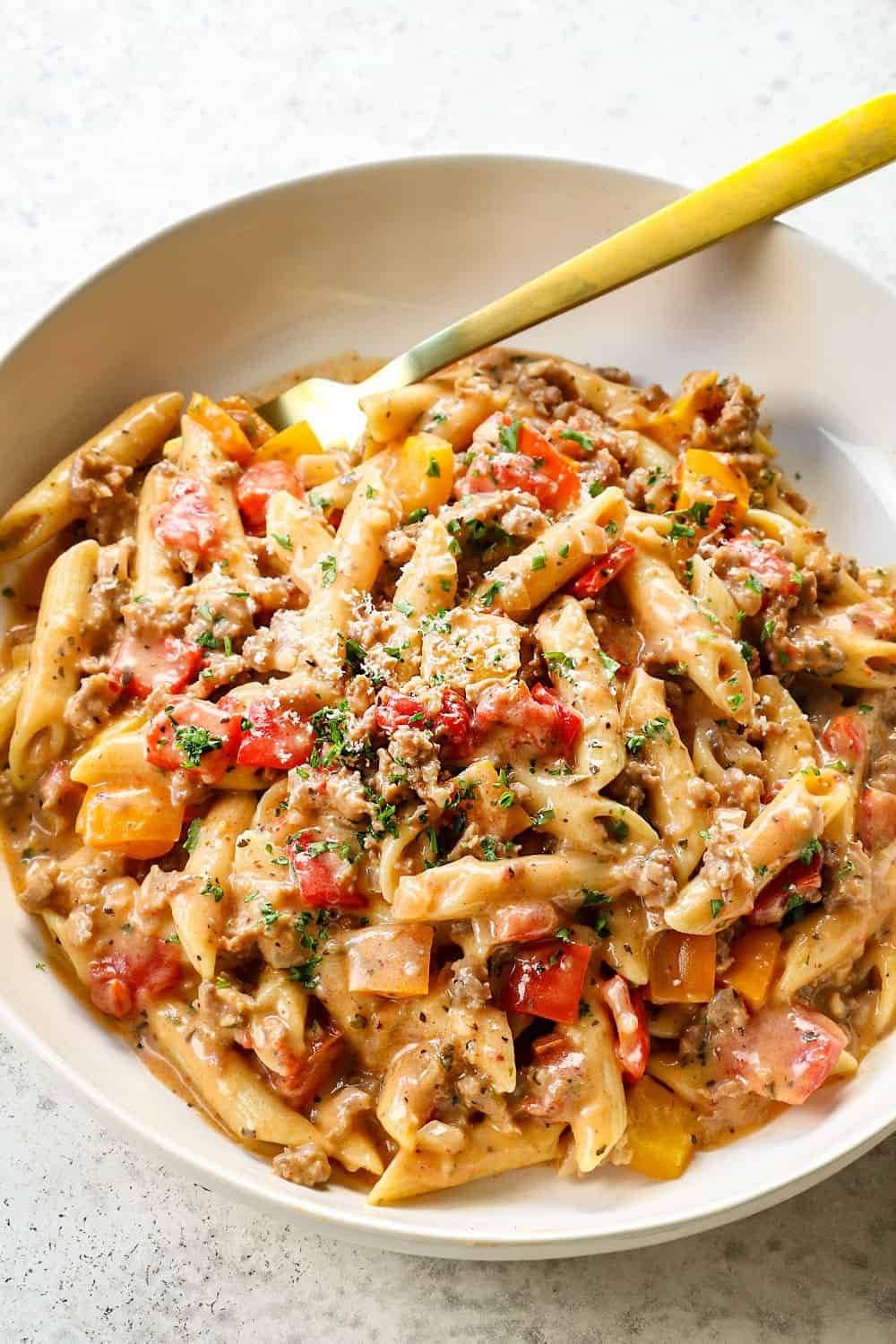 Sausage and peppers pasta in a bowl with Italian-style sauce