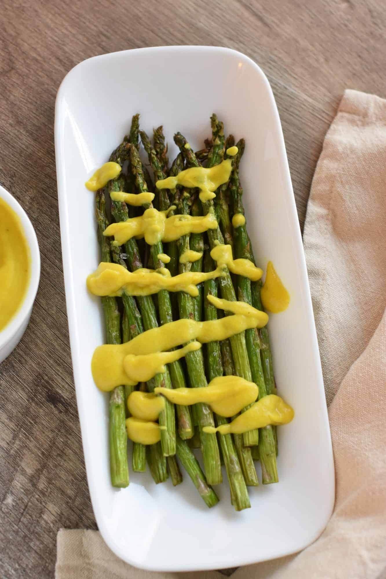 Air fryer asparagus on a plate.