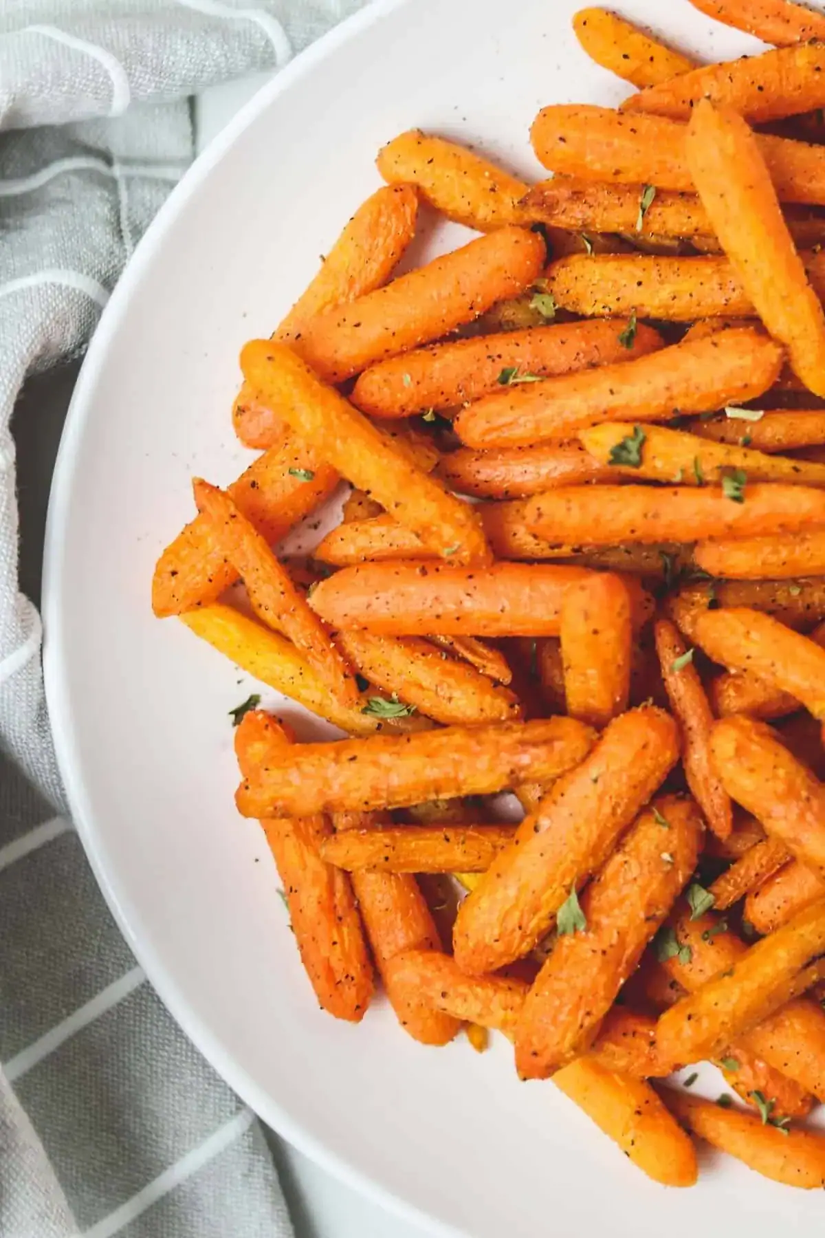 Air fryer carrots cooked until tender and browned.
