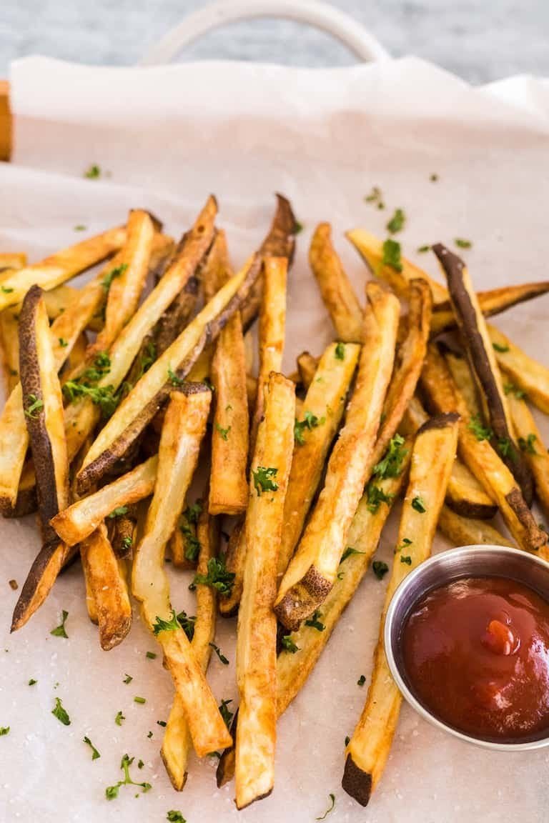 Crispy air fryer French fries on a plate.