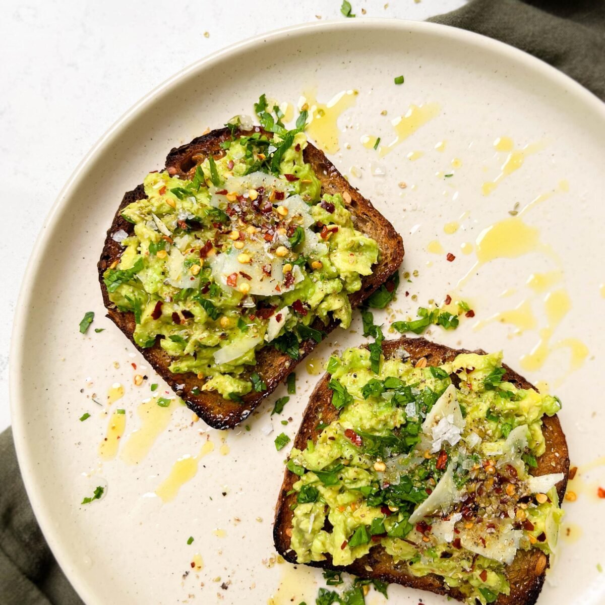 Perfect avocado toast with creamy smashed avocado on toasted bread
