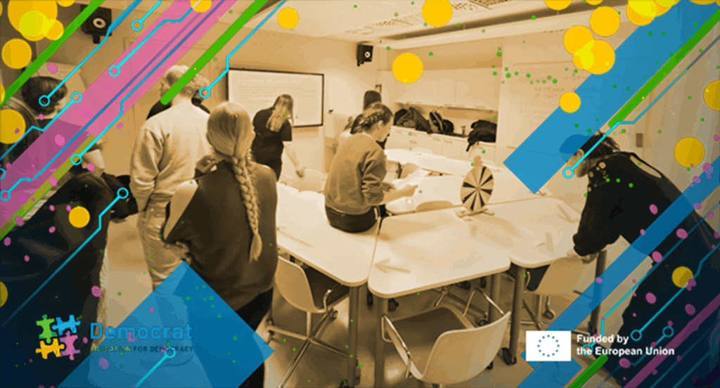 A group of future teachers and university instructors collaboratively designing democratic learning activities in a workshop setting.