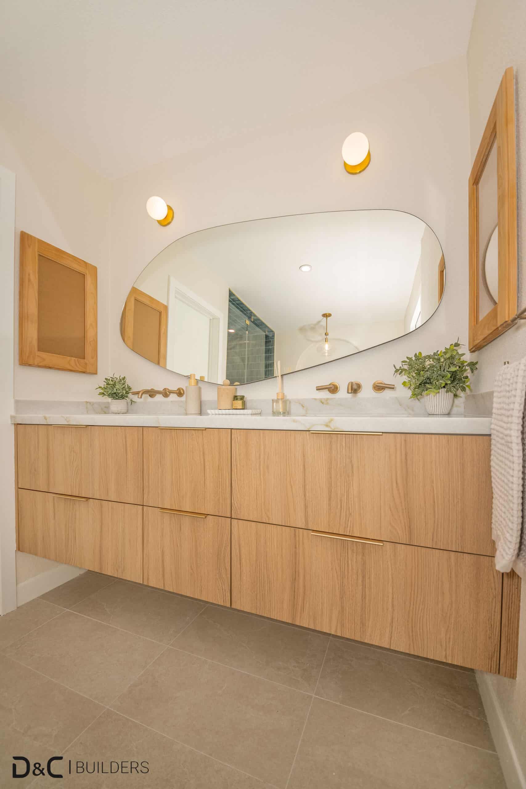 Double vanity bathroom with large mirrors