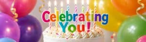 Colorful birthday cake with "Celebrating You!" candles surrounded by vibrant balloons, symbolizing appreciation and celebration for special individuals.
