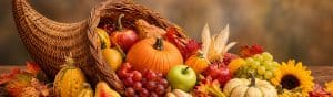 Vibrant autumn harvest with pumpkins, apples, grapes, and gourds arranged for Thanksgiving celebration. Perfect for sharing gratitude and seasonal festivities.
