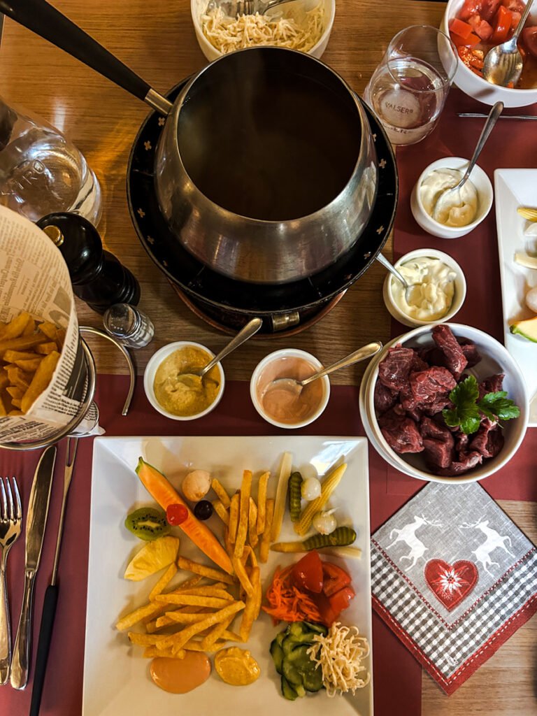 Whymperstube, Zermatt meat fondue broth and sides.