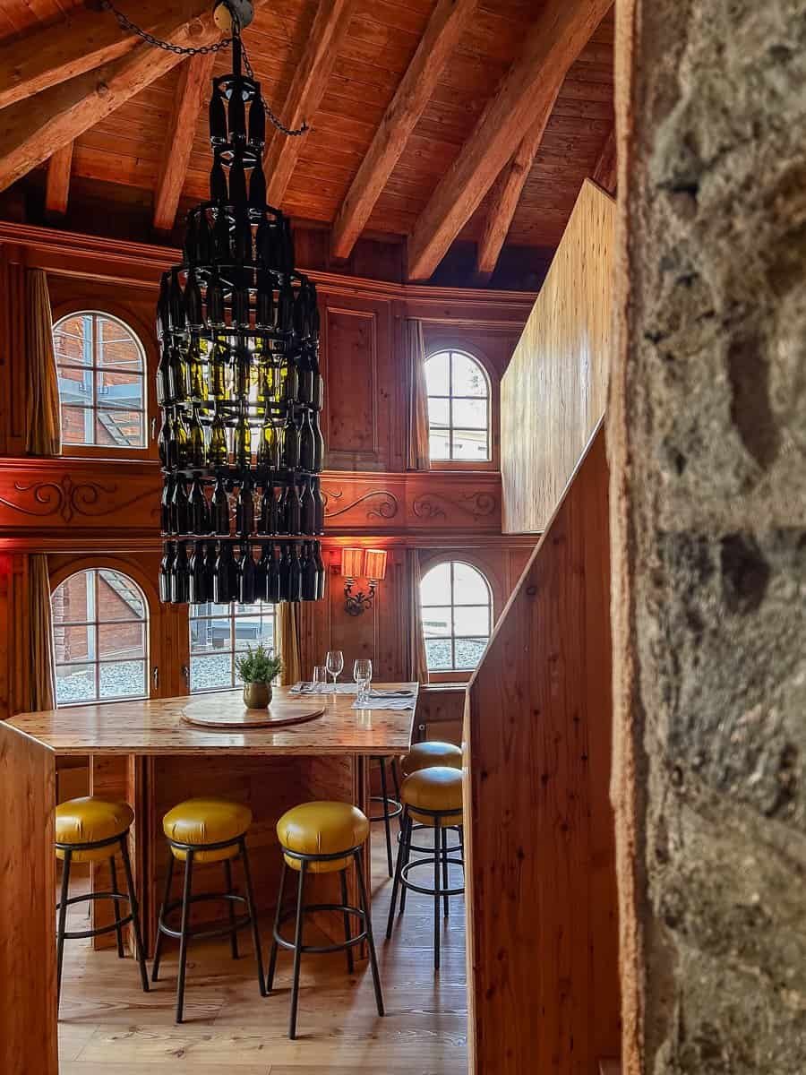 Wine bottle chandelier at Beausite, Zermatt.