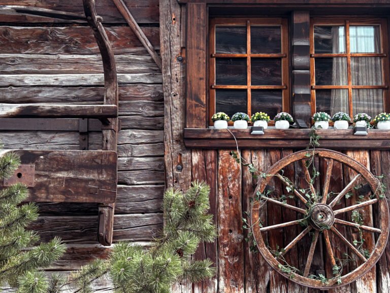 Traditional wooden building and plants in Zermatt, Switzerland.