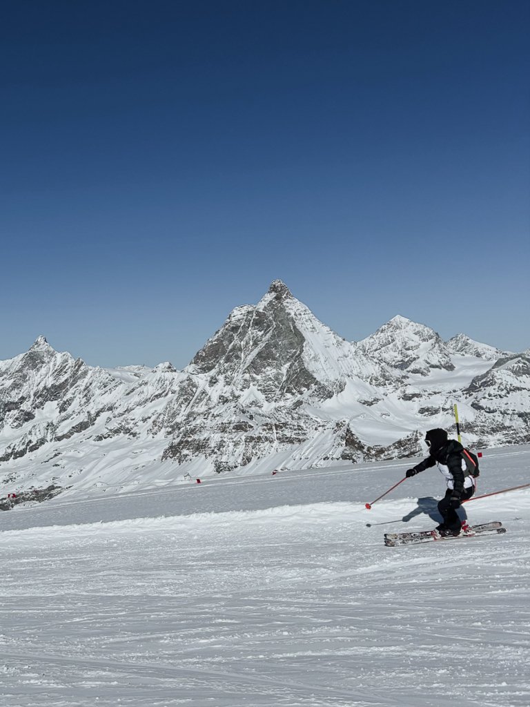 Skier in front of Cervino Mountain in Cervinia.