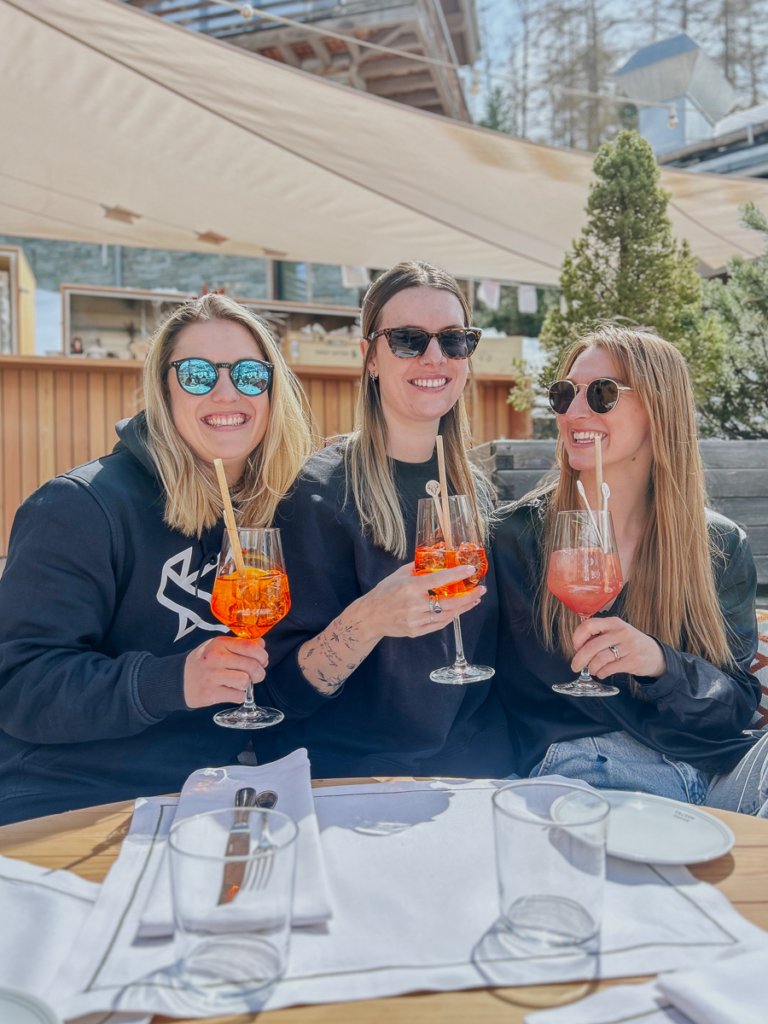 Women having coktails and mocktails at Cervo, Zermatt.