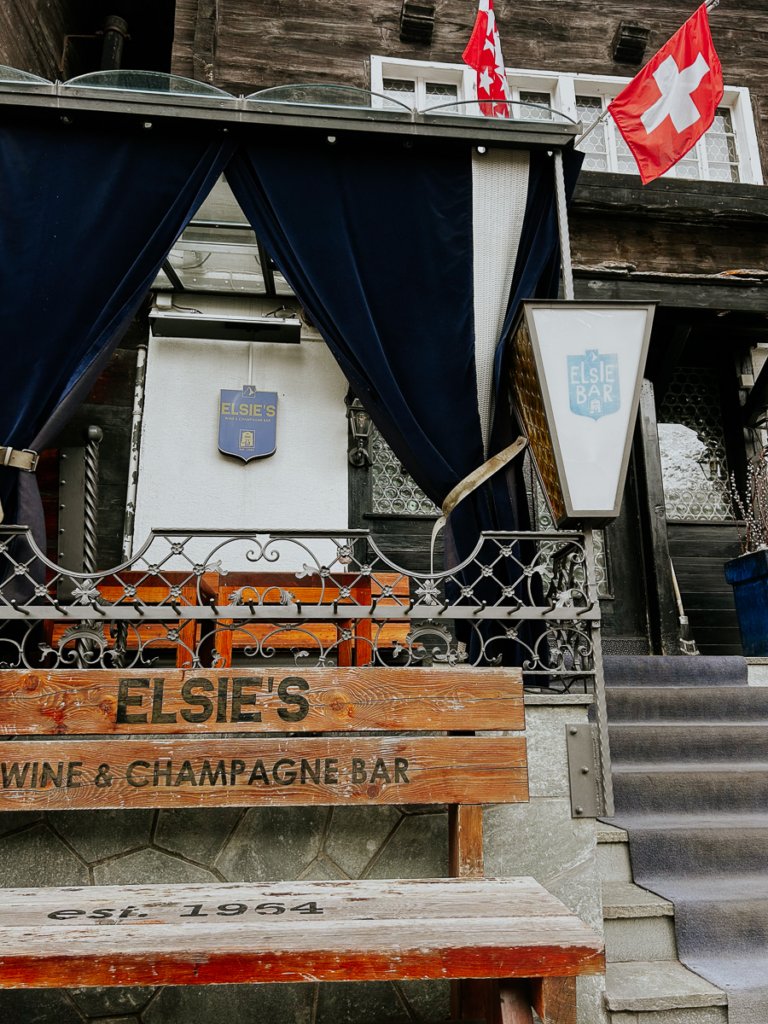 Elsie's Bar in Zermatt, from the outside with Swiss Flags.