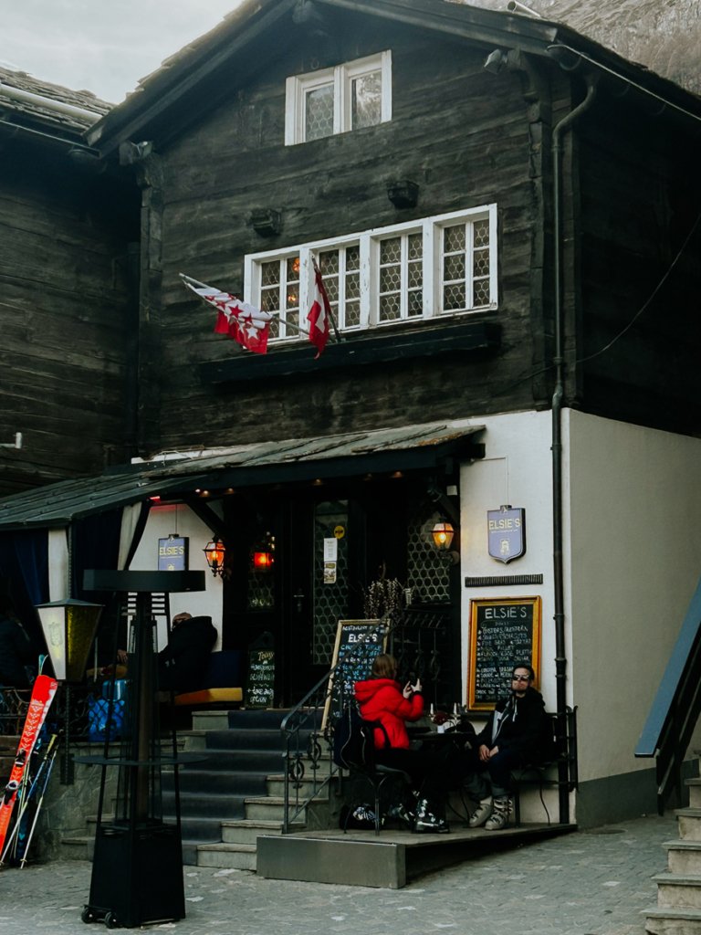 Traditional Swiss building, bar in Zermatt.