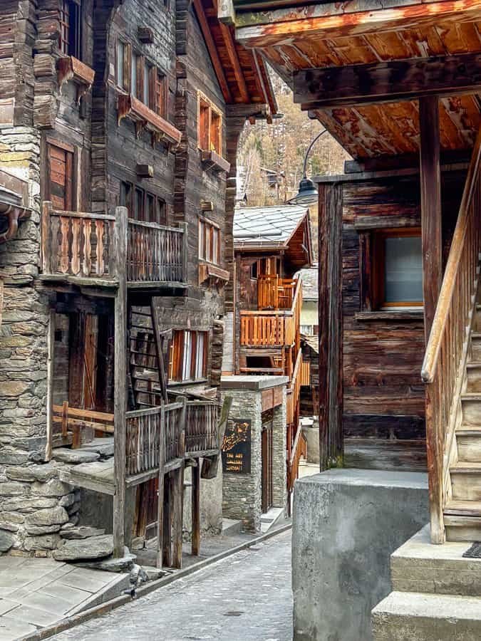 Old Swiss buildings in old-town Zermatt.
