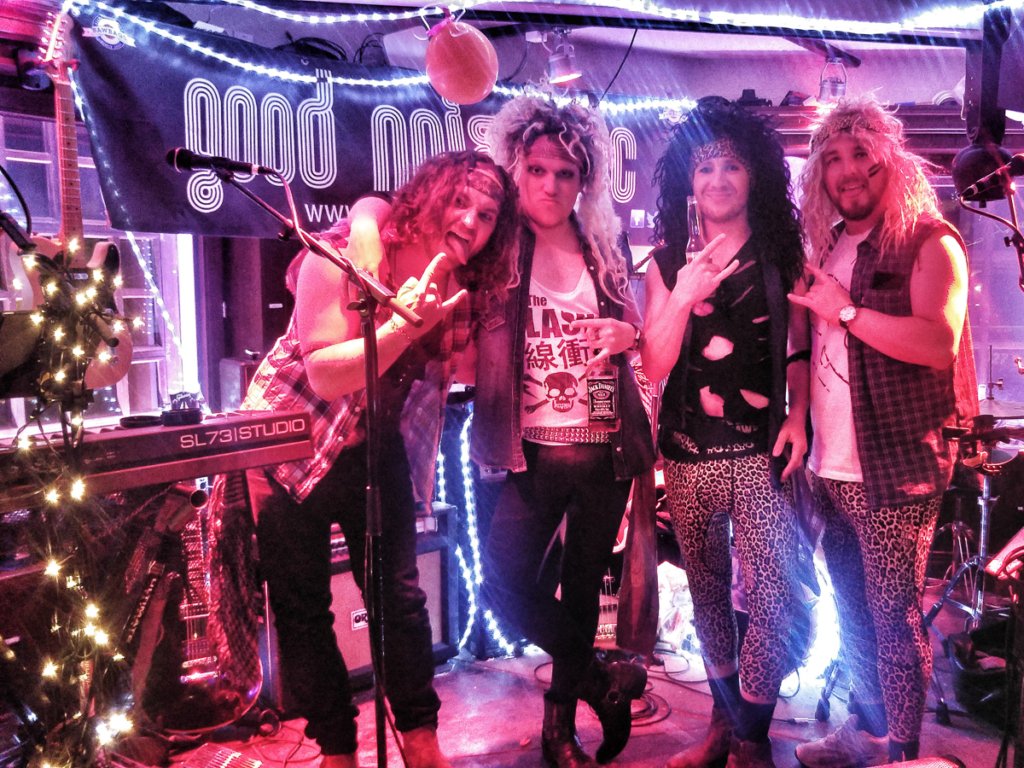 Musicians in 80's fancy dress at the Après Ski bar Papperla Pub, Zermatt.