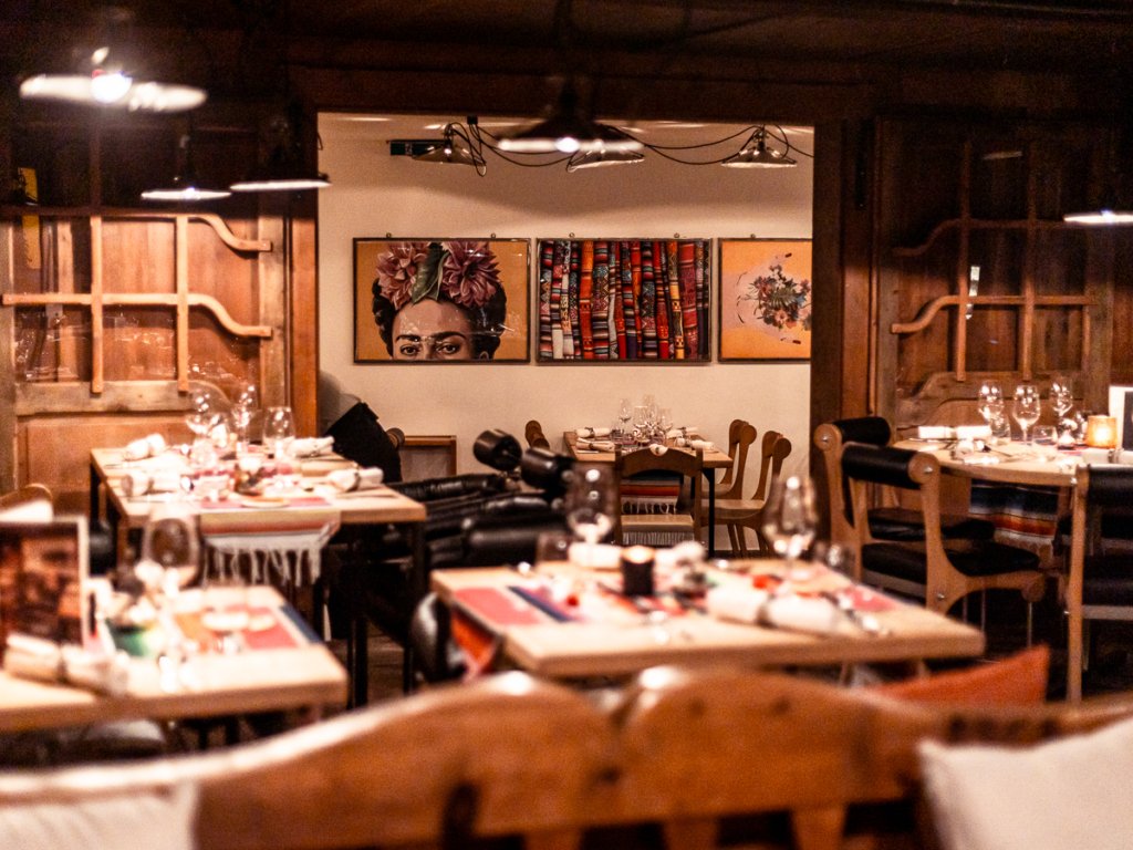 Table settings in a chalet style restaurant at 1818, Zermatt.
