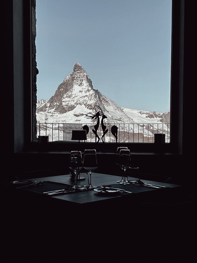 Glacier Alpine Kitchen table and view of the Matterhorn in winter.