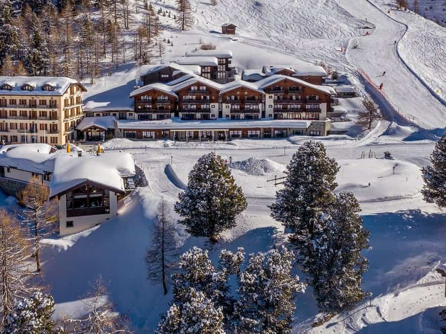 Riffelalp Resort 5 star hotel in Zermatt, beside the piste in winter.