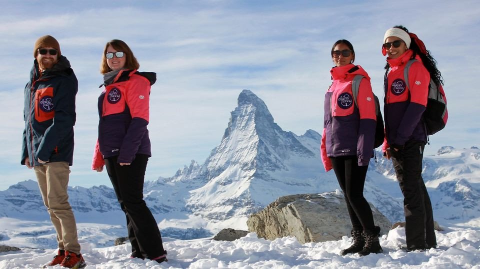 Some of the Alpine Nanny Zermatt team in front of the Matterhorn.