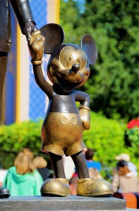 Beyond the Castle: A Look at the Partners Statue Through Time 6 mickey 4