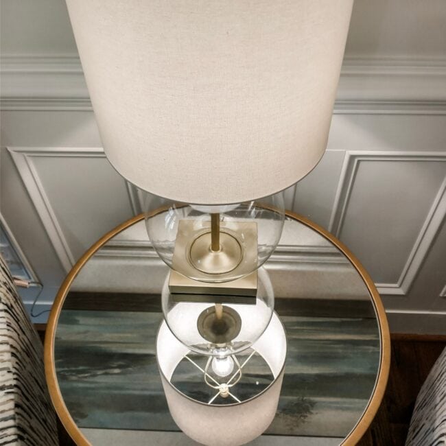 Versatile home decor featuring a modern glass-based table lamp perfect for living rooms or bedrooms.