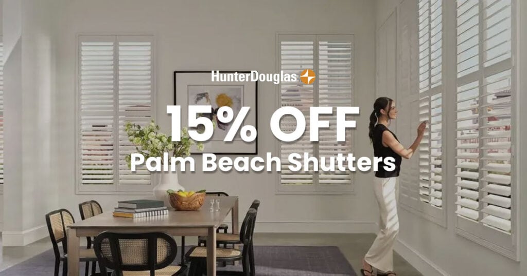 Woman adjusting white plantation shutters in bright dining room.
