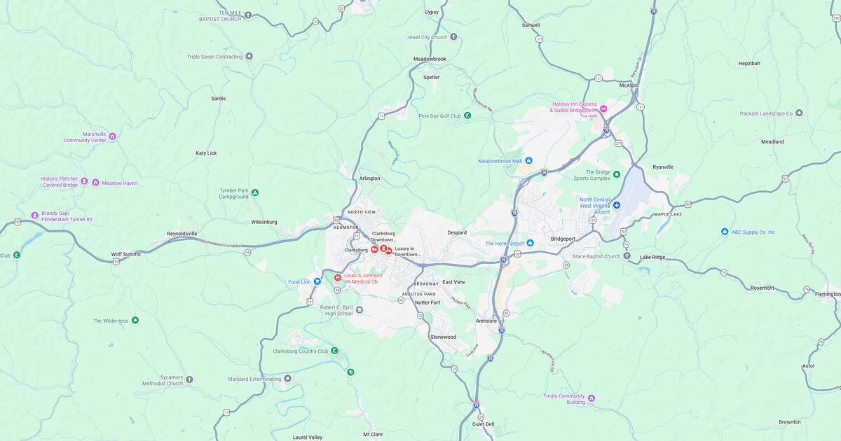 Detailed map showing downtown and nearby neighborhoods with roads and landmarks.