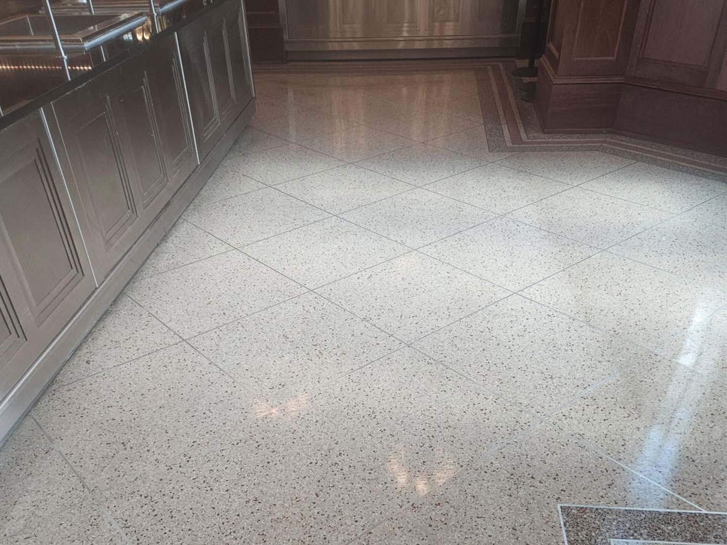 dpm-surface-care-terrazo-after-img A clean and restored terrazzo floors in a commercial office, after terrazzo floor cleaning and restoration. DPM Surface Care