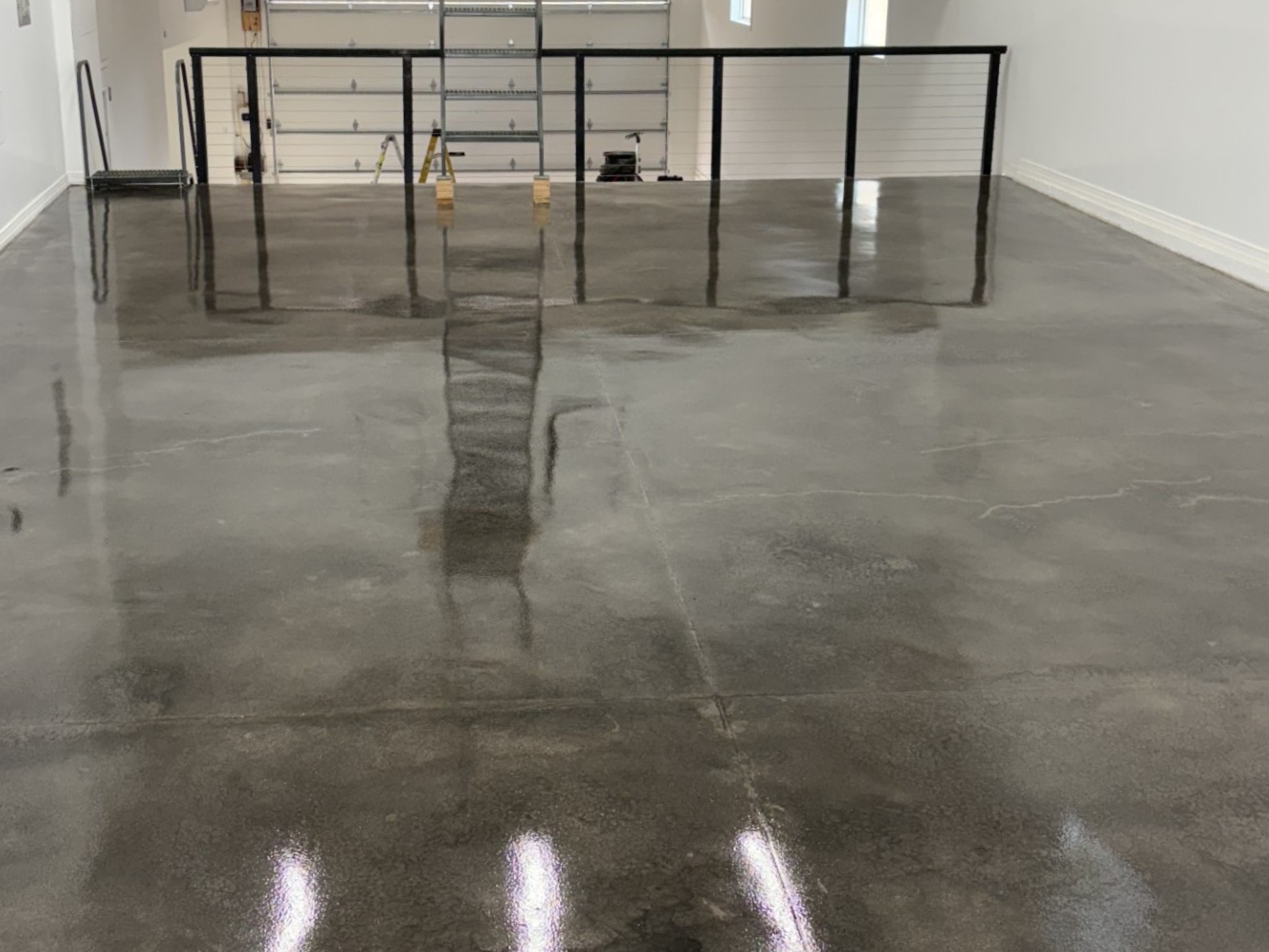 Polished concrete floor in garage. Polished with dye.