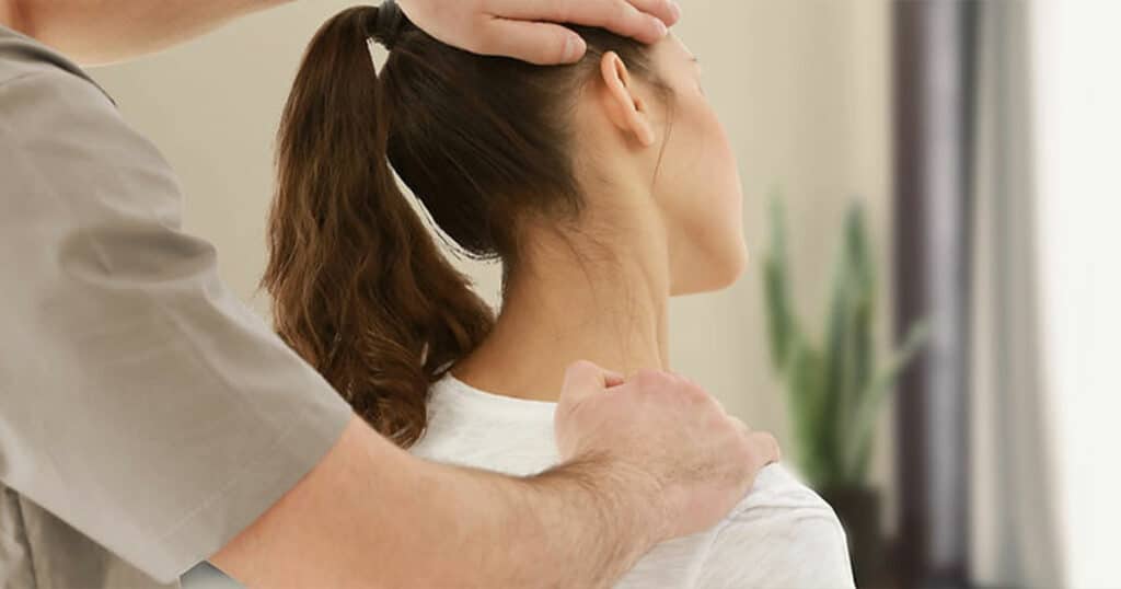 Chiropractic adjustment for neck pain and wellness by Dr. Rebecca-Jane McAllister.