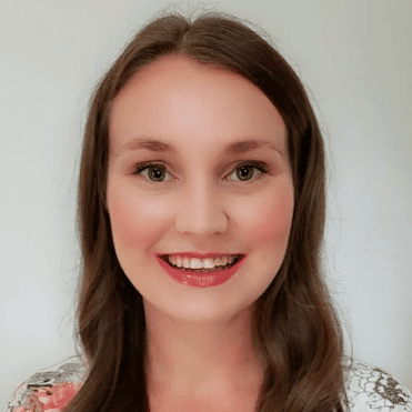 Experienced female medical professional smiling at camera for Dr. Rebecca-Jane McAllister website.