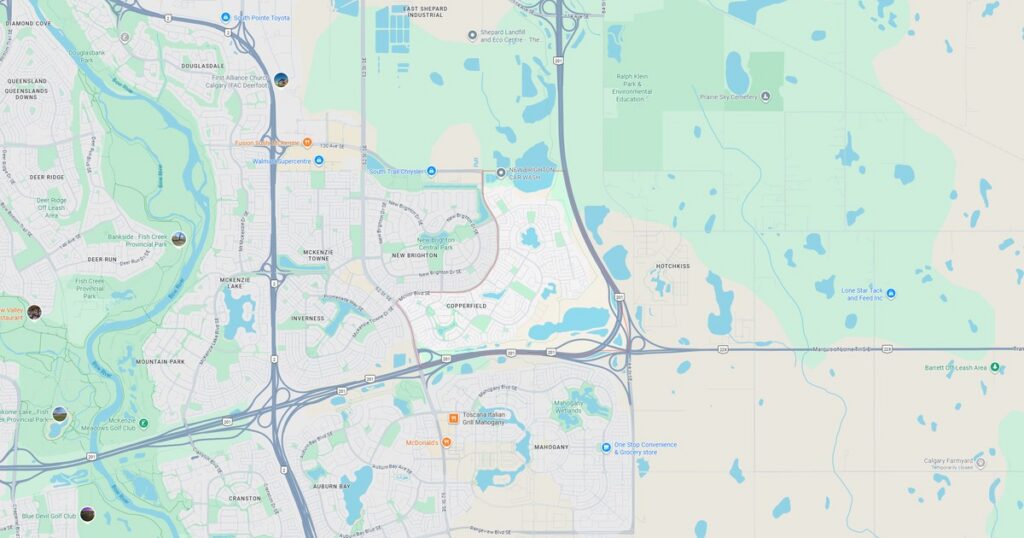 City map with roads, lakes, and parks in a suburban setting.