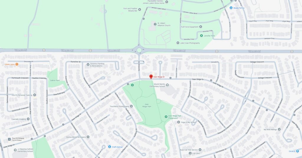 Map of a neighborhood park featuring walking trails and green spaces.