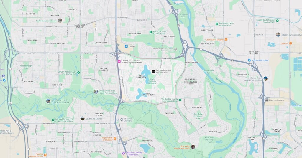 City map with roads, parks, and rivers for navigation and planning.