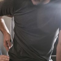 Back pain relief consultation with Dr. Rebecca-Jane McAllister, chiropractor specializing in pain management and spinal health.