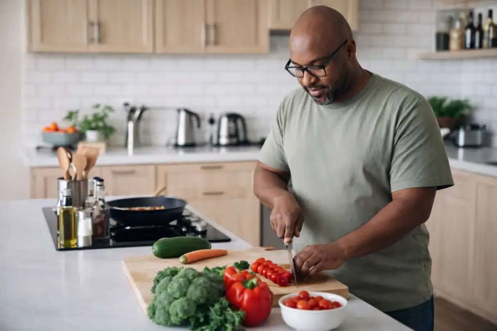 Home cook preparing food safely in a clean organized kitchen environment