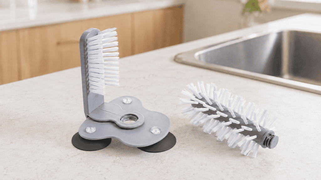 DTDF glass cleaner with removable brush head and black suction-cup base