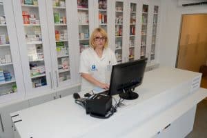 Pharmacist at the pharmacy counter in Dom zdravlja Merosina.