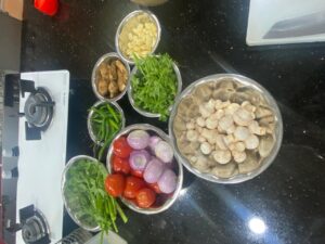 סדנת בישול בAsha Kumar Cookery האמפי, הודו איסטקארד
