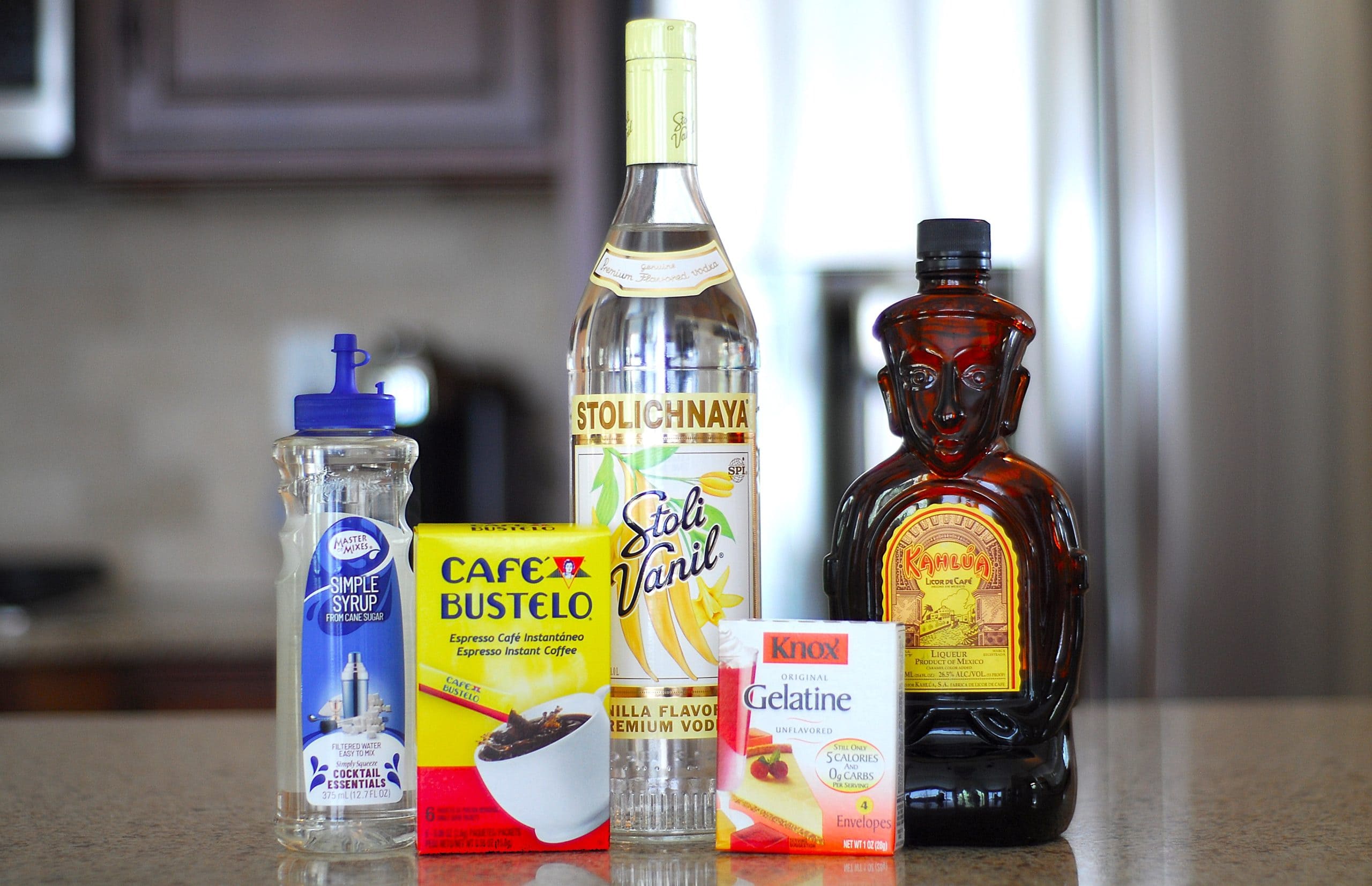 Espresso Martini Jello Shots Ingredients: Vanilla Vodka, Kahlua Coffee Liqueur, Espresso Powder, Simple Syrup, and Gelatine