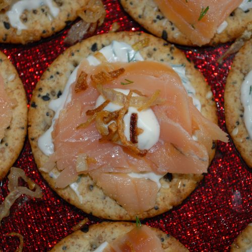 Smoked Salmon with Crispy Shallots on a multigrain crackers