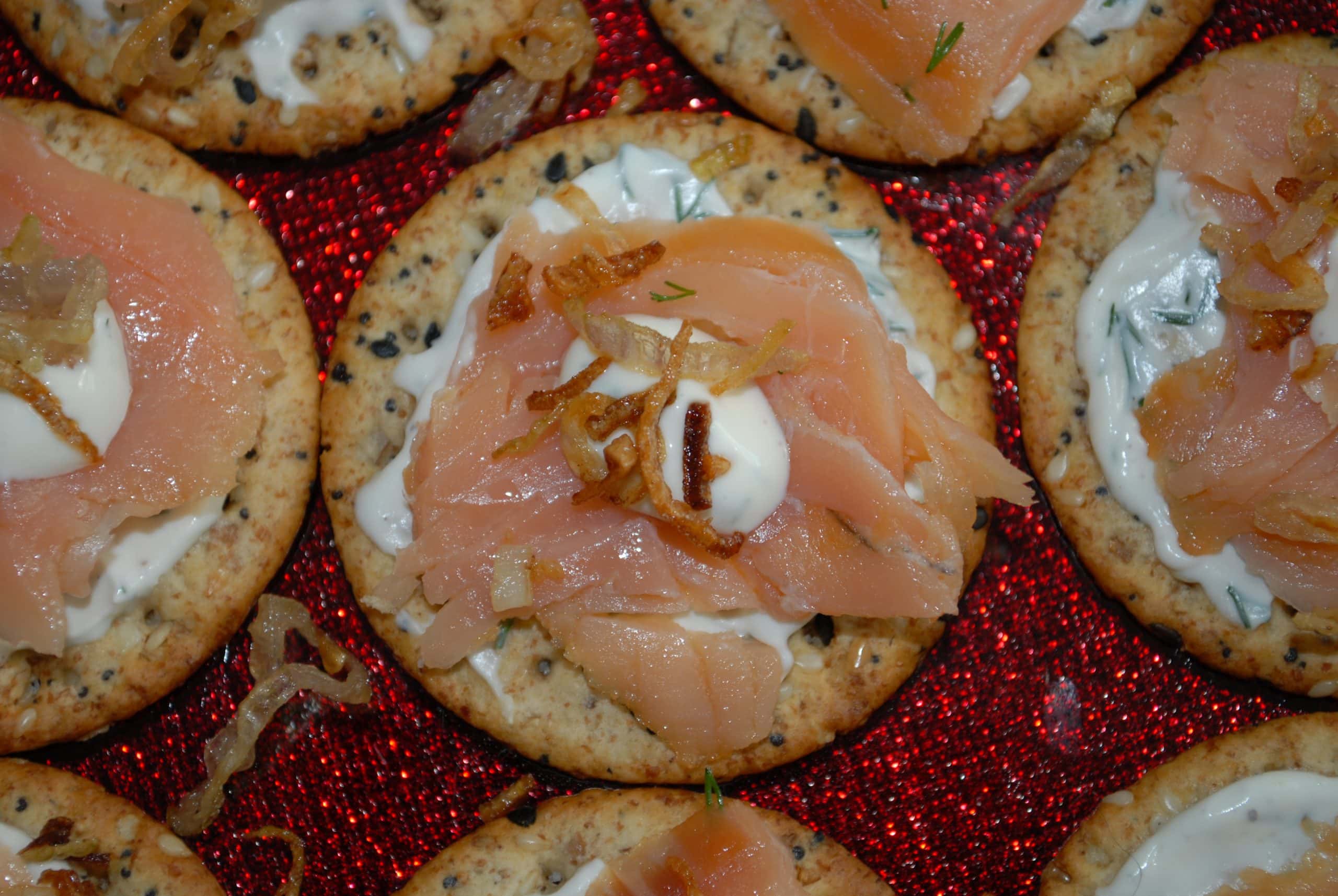 Smoked Salmon with Crispy Shallots on a multigrain crackers