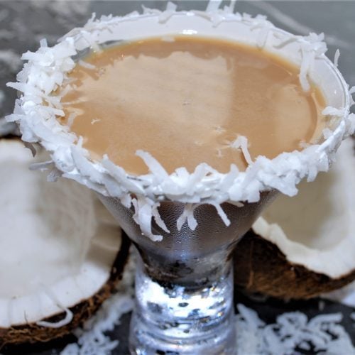 Coconut Espresso Martini with a shredded coconut rim