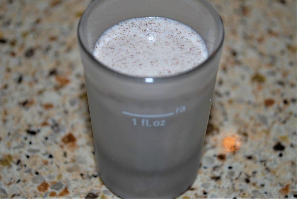 Oreo Cookie Shooter in shot glass and ready to enjoy