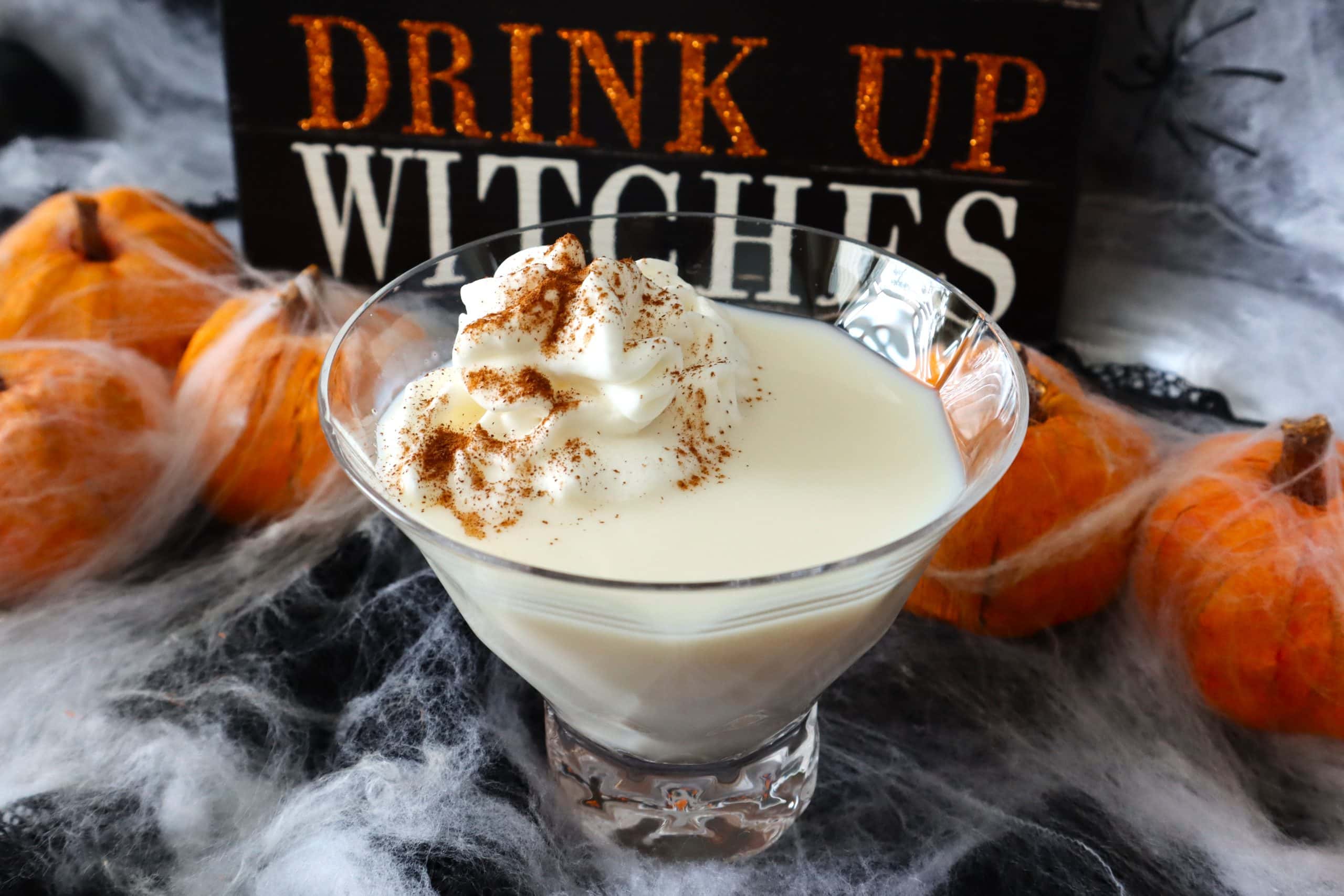 RumChata Pumpkin Pie Martini with a dollop of whipped cream and cinnamon